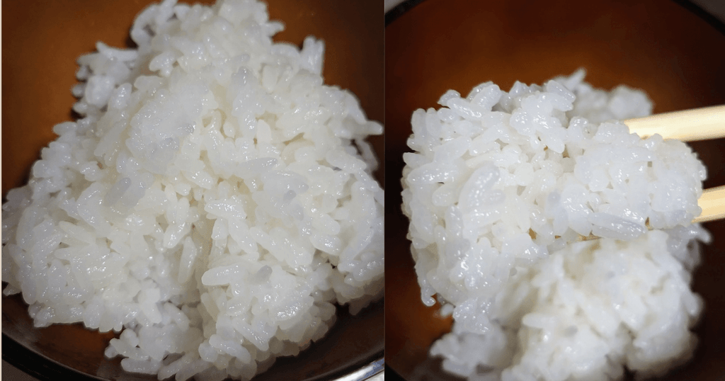 炊き上がった銀河のしずくと箸で持ち上げた白ご飯の粒